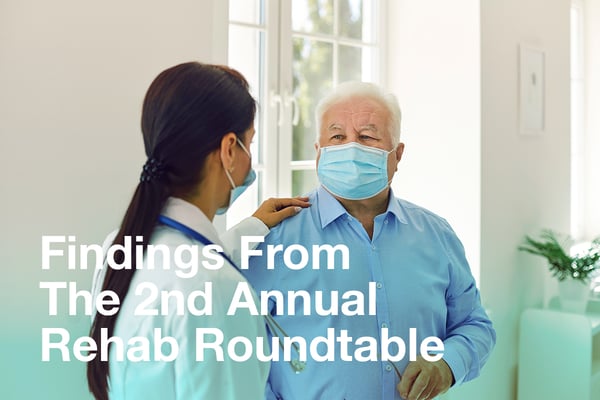 Two people with masks talking